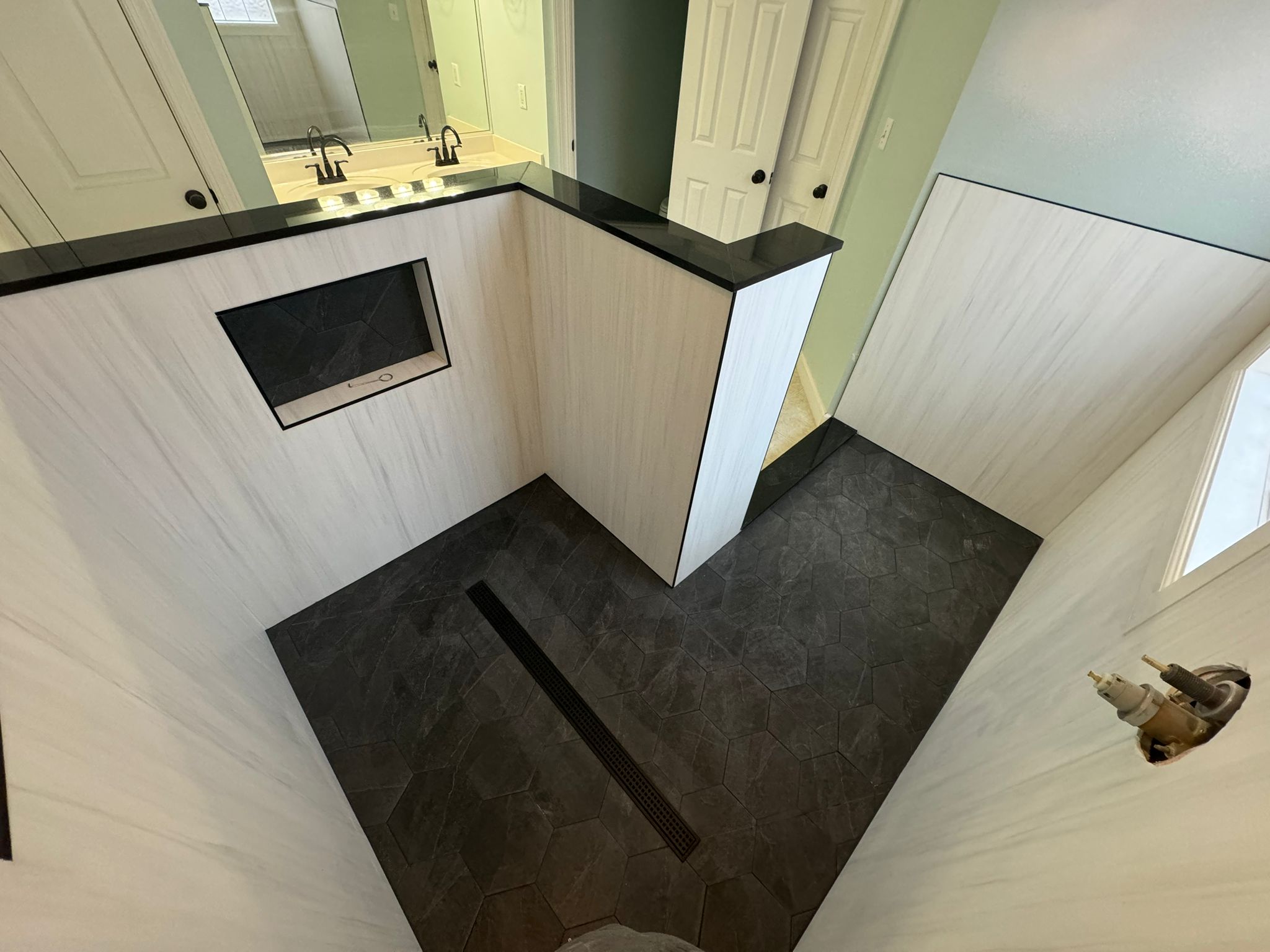 Finished shower and vanity combination